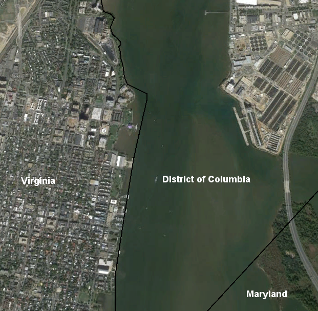 District of Columbia maps show that its boundary shifts from the high-water mark to the pierhead line, near the Canal Center complex in Alexandria