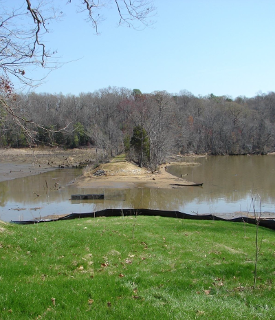 the dam for Charles Lake was removed in 2010, after storm damage in 2006