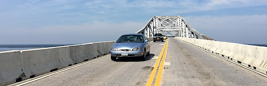 the old Nice Bridge lacked safe access for bike/pedestrian traffic (and the new bridge did not provide the planned dedicated lane)