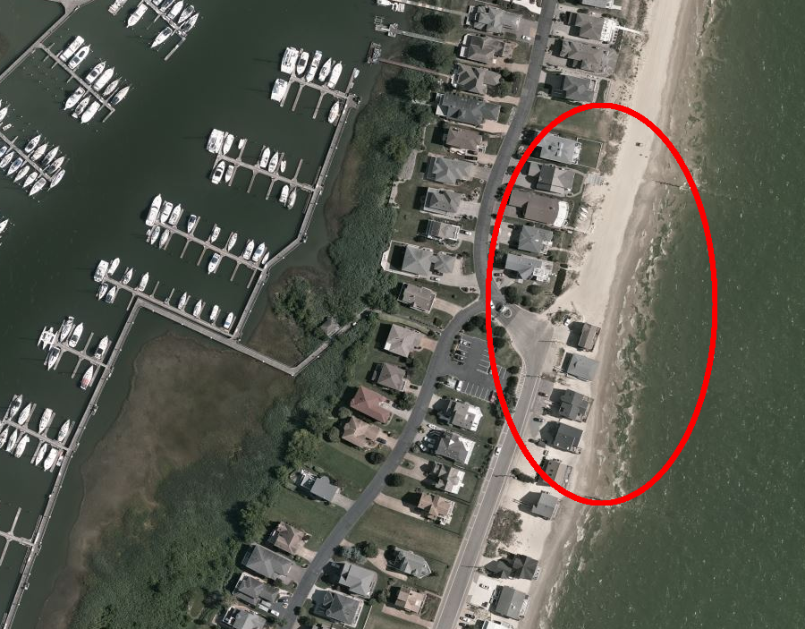 south of the public parkland at Salt Ponds, houses have been built  on private land as close as possible to the mean low-water mark (City of Hampton)
