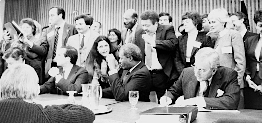 Joseph Gartlan, Jr., chair of the Chesapeake Bay Commission, signing the original Chesapeake Bay Agreement at George Mason University on December 9, 1983