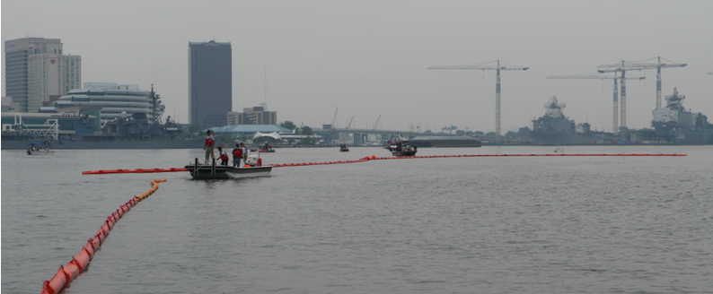 practicing placement of boom to capture oil spill in Elizabeth River