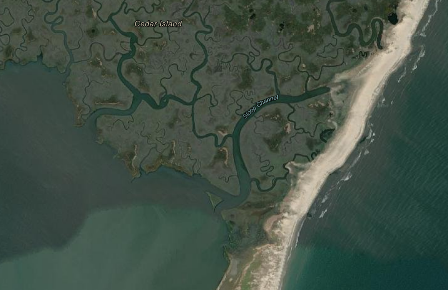 the eastern edge of Cedar Island is a thin wedge of sand, with a backbarrier marsh to the west
