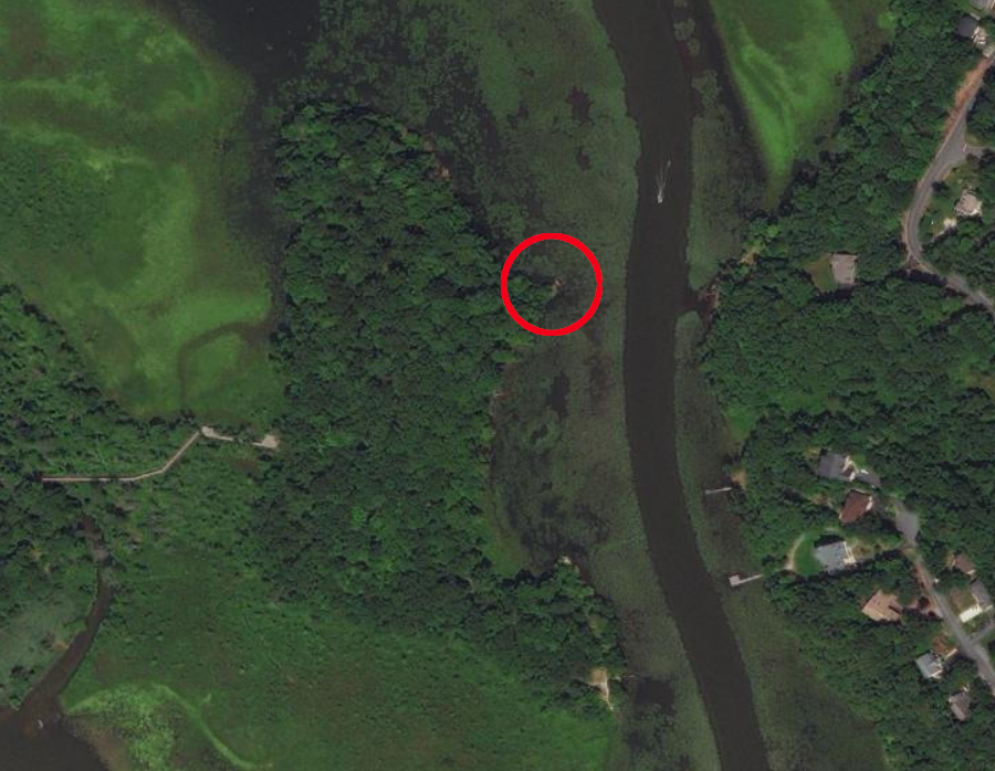blocks of unfinished sandstone were shipped from Government Island via scows that loaded at a stone wharf (red circle)