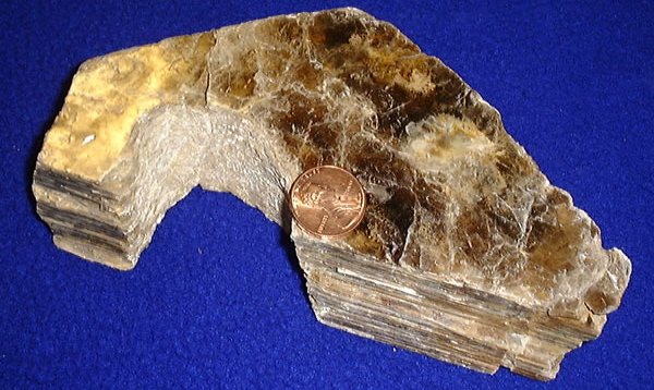 mica crystallizes into layers which can be split easily into sheets of translucent rock