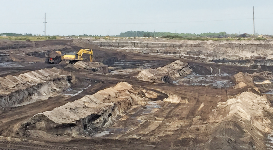 in the Coastal Plain, heavy titanium minerals within lighter sediments are extracted using gravity separation at shallow, temporary strip mines