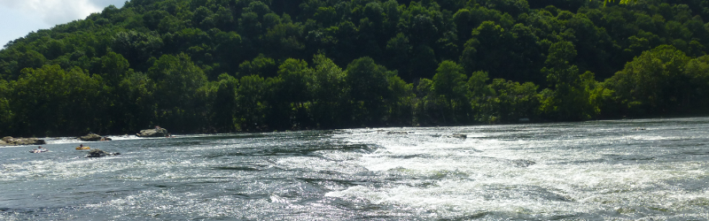 McCoy Falls on the New River was created by differential erosion - the hard quartzite layer of Walker/Sinking Rock Mountain is eroding away slower than the limestone on either side