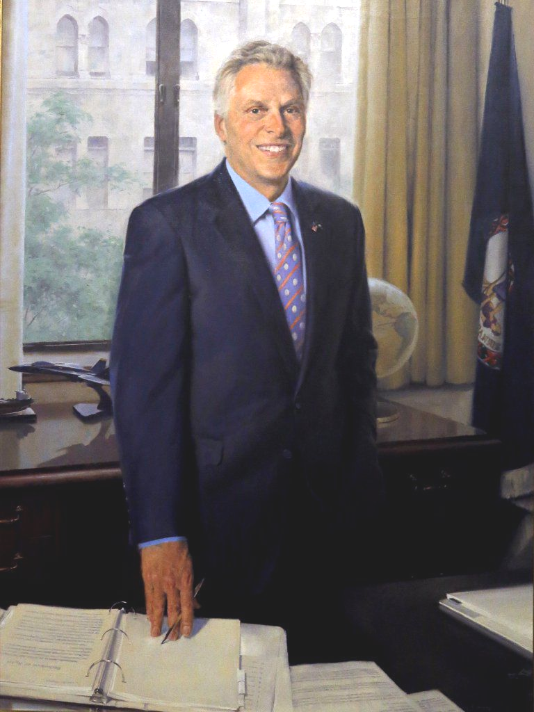 in his official portrait, Gov. Terry McAuliffe showed himself working on his rights restoration initiative