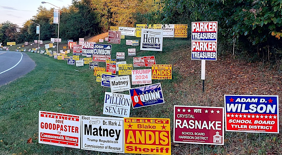 candidate signs lined the road to an early voting location in Washington County (September 30, 2023)