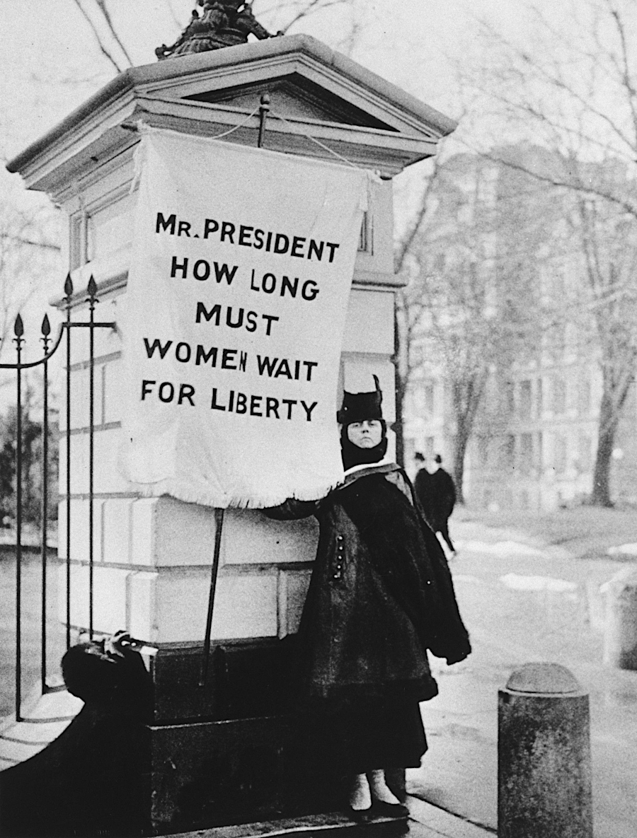 a Silent Sentinel of the National Women's Party, picketing the White House on January 30, 1917