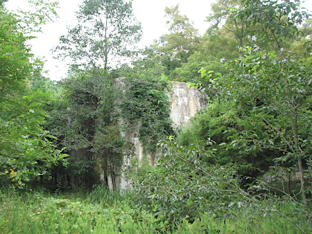 massive walls made of concrete blocks, use in development of the Mark 8 nuclear warhead, still remain on Tisdale Road