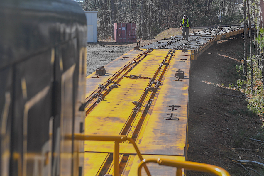 utility rail branch locomotive engineer checking flatcars at Joint Base Langley-Eustis