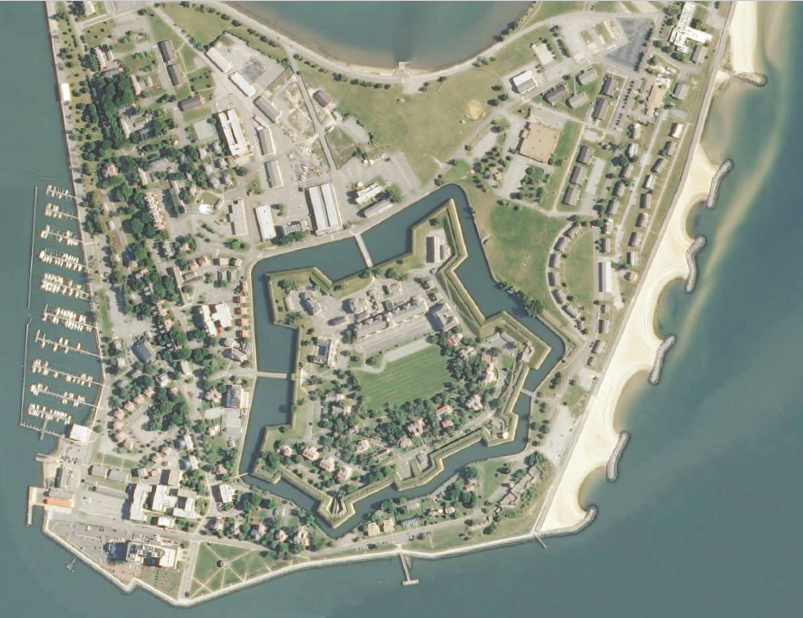 the eastern shoreline at Fort Monroe is protected by artificial breakwaters, while the western side has a marina sheltered from storms by Point Comfort
