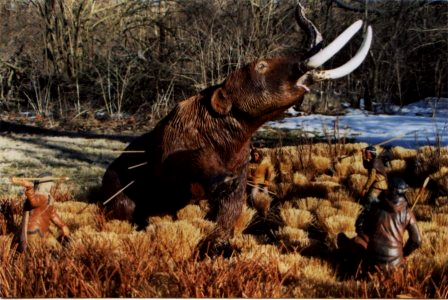 hunting party killing a mastodon, perhaps for ritual more than meat