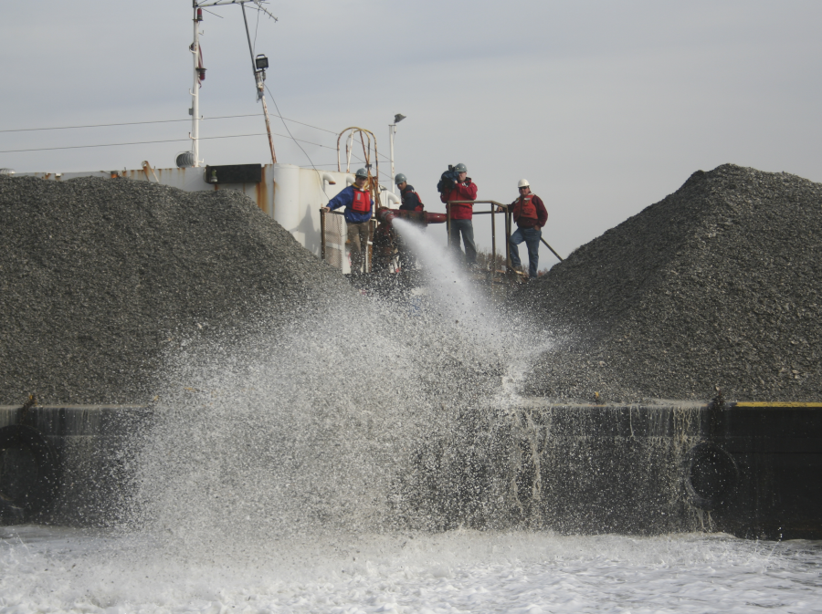 oyster shell can be barged to a reef restoration site, then washed overboard