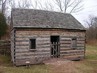 reconstructed slave quarters (Sudley)