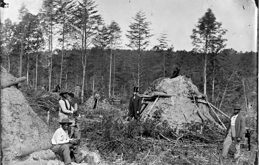 woodcutters lived in primitive huts along the railroad tracks, far less comfortable than the houses of the landowners who contracted with the railroads to supply fuel
