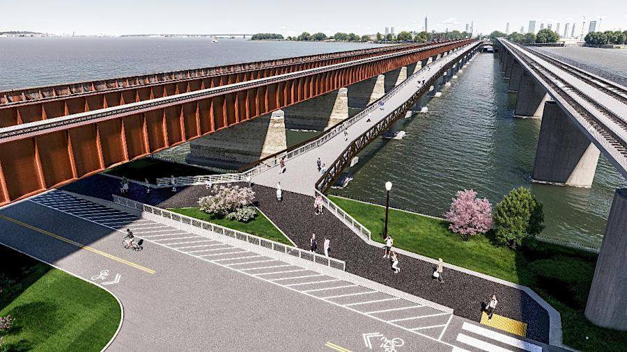 the bike/pedestrian bridge was designed to be located between the old and new bridges with railroad tracks