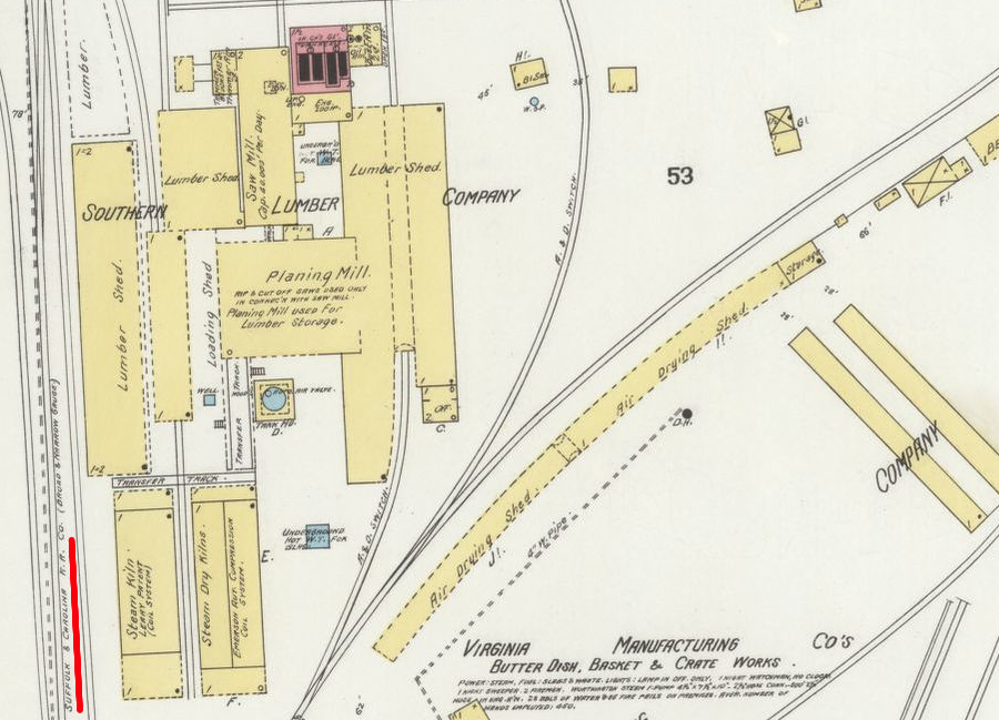 the Suffolk and Carolina Railroad stopped at the mills in Suffolk, and did not connect to a shipping terminal in Portsmouth or Norfolk