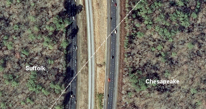 the Commonwealth Railway is now located in the median of I-664 where it crosses the boundary between the cities of Suffolk and Chesapeake