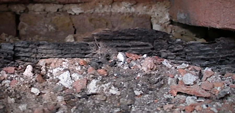 evidence of the burning of the wooden cap/steeple that was once on top of the Jamestown church tower
