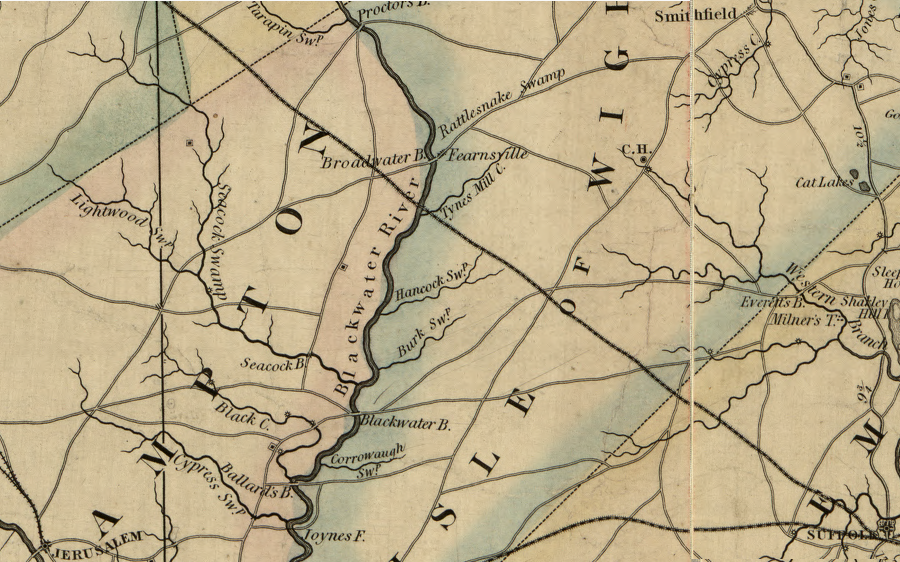 as shown in this 1859 map, the Norfolk and Petersburg Railroad was built first across the swampland northwest of Suffolk, and only later was a parallel road (now US460) constructed