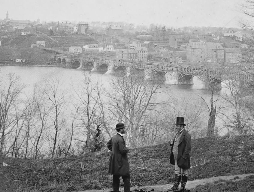 the C&O Canal was extended to Alexandria when an aqueduct was built across the Potomac River (and the aqueduct was used as a bridge during the Civil War)