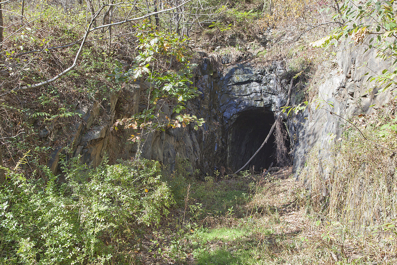 Irish immigrants and enslaved men carved the original Blue Ridge Tunnel in 1850-58, allowing trains to pass beneath Rockfish Gap