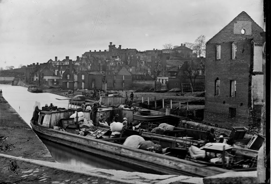 soon after the Evacuation Fire in April 1865, James River and Kanawha Canal boats were loaded and unloaded in Richmond, moving goods and people across the Fall Line