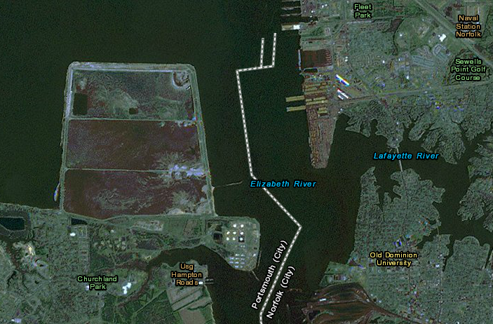 Craney Island, like the Norfolk Navy Yard, is located within the city boundaries of Portsmouth - across the Elizabeth River from the Norfolk Naval Base within the city of Norfolk