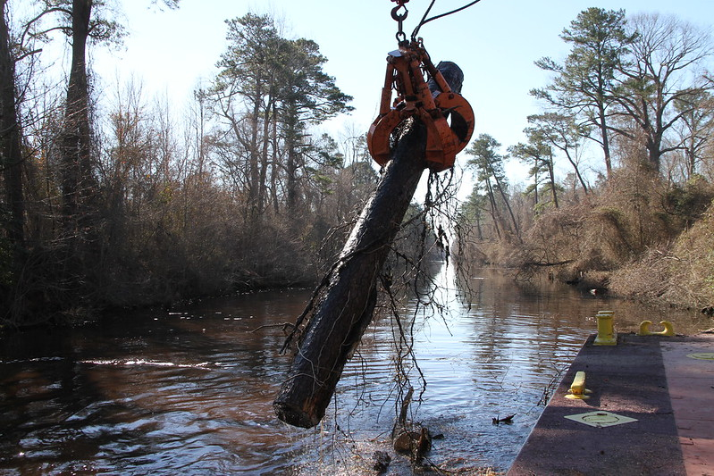 a crane barge removed downed trees in the feeder ditch after Hurricane Mathew in 2016