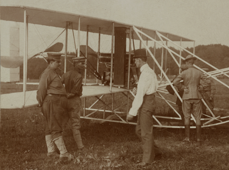 Orville Wright prepares to demonstrate airplane flight to military officers at Fort Myer (1915)