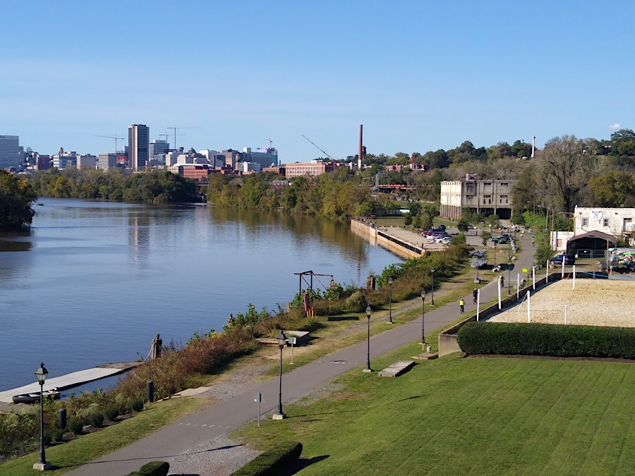 looking upstream from Rocketts Landing past Intermediate Terminal towards the skyline of Richmond in 2020