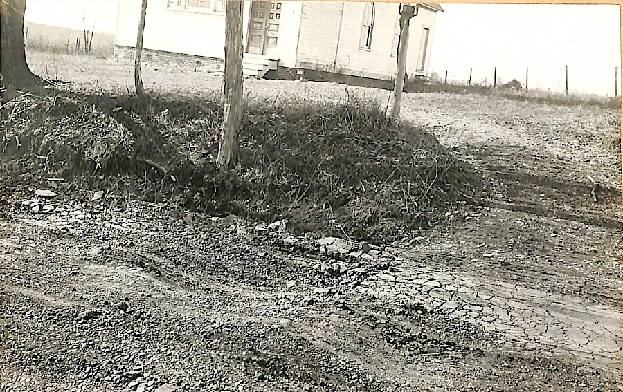 the first paved roads, with an inadequate dirt base and drainage, crumbled within just a few years