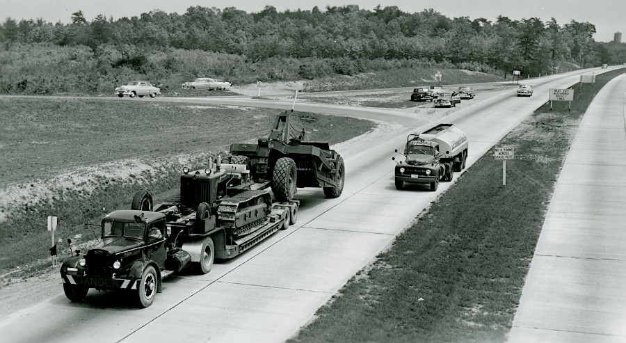 transporting construction equipment on the four lane, divided Shirley Highway in 1953