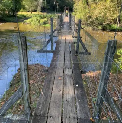 the Virginia Department of Transportation closed the swinging bridge over the Robinson River at Lindsay Lane in 2020