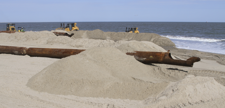 the Corps of Engineers pumped sand from offshore to build a wider beach to protect Wallops Island infrastructure
