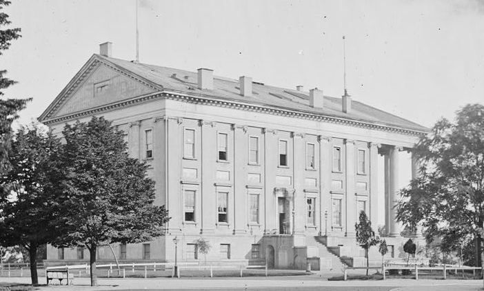 the Capitol building was a rectangular structure until 1904, when wings were added to house the House of Delegates on the east and the State Senate on the west
