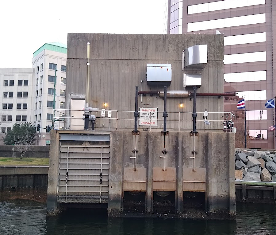 a pump station to manage floodwaters is on the Norfolk waterfront, next to the USS Wisconsin