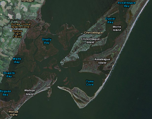Chincoteague Island is separated by water from the mainland (to the west) and Assateague Island (to the east)