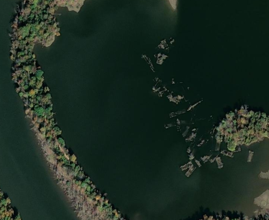 barges that one hauled sand and gravel now form an underwater graveyard at Dutch Gap on the James River