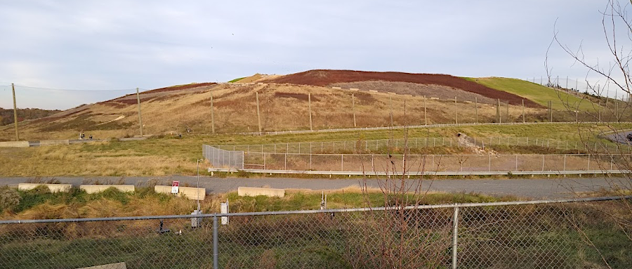 when full, landfill cells are capped with clay and become local hills