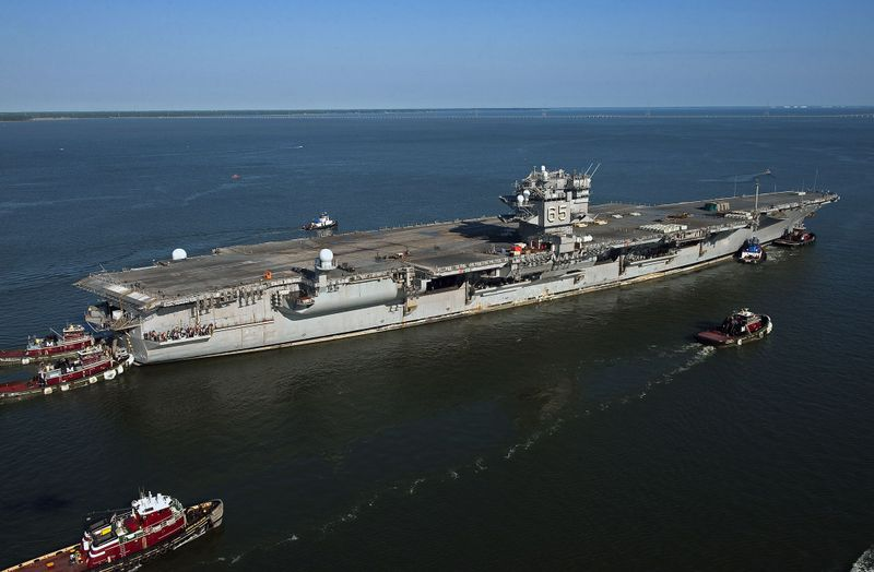 in 2013, the USS Enterprise was towed from Naval Station Norfolk to the Newport News Shipbuilding facility for defueling