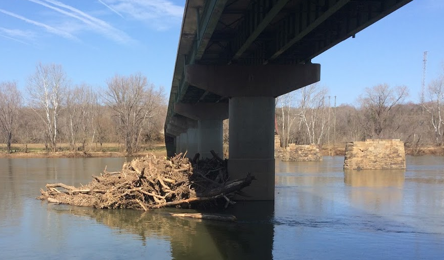 flood debris on the upstream side of bridge piling at Cartersville, where VA 45 crosses James River