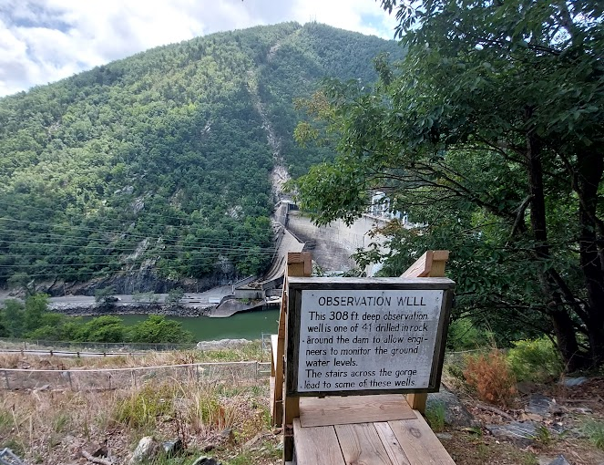 observation wells measure if water is flowing through the Candler Formation and potentially threatening the integrity of the dam's foundation