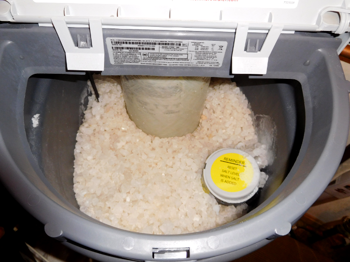 water softeners replace calcium atoms with sodium to reduce the hardness of water